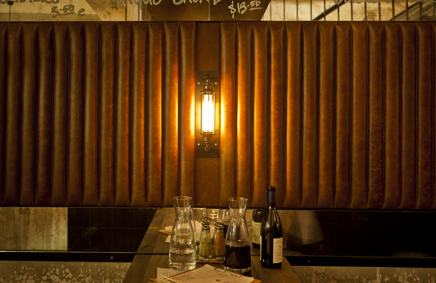 Grossi cafe Ombra using cage wall lamps