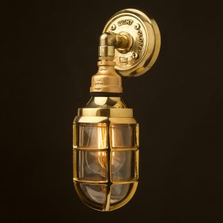 Outdoor brass and plumbing pipe bunker cage wall light