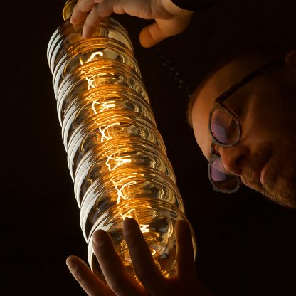 6 Watt dimmable filament LED amber glass long disc globe